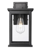 11"H Bowton II Outdoor Wall Light - Dusk to Dawn Matte Black Finish with Glass Shade by Millennium Lighting